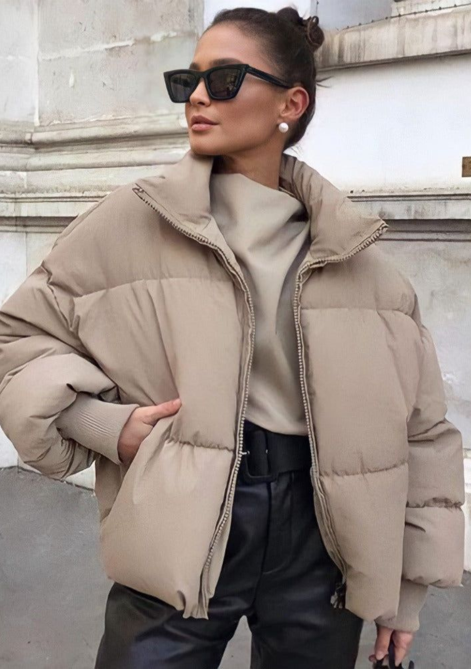 A long coat worn on a cold street